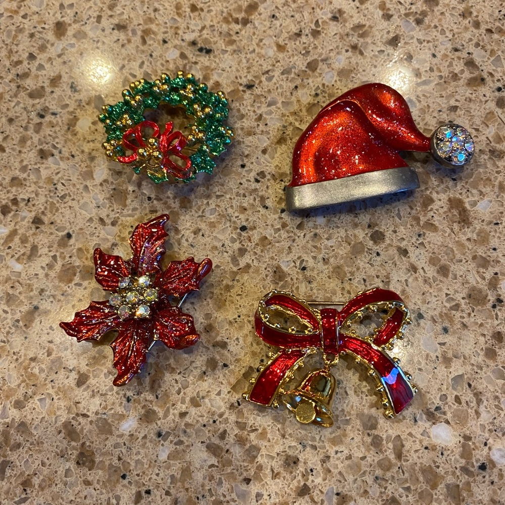 Four Christmas holiday pins